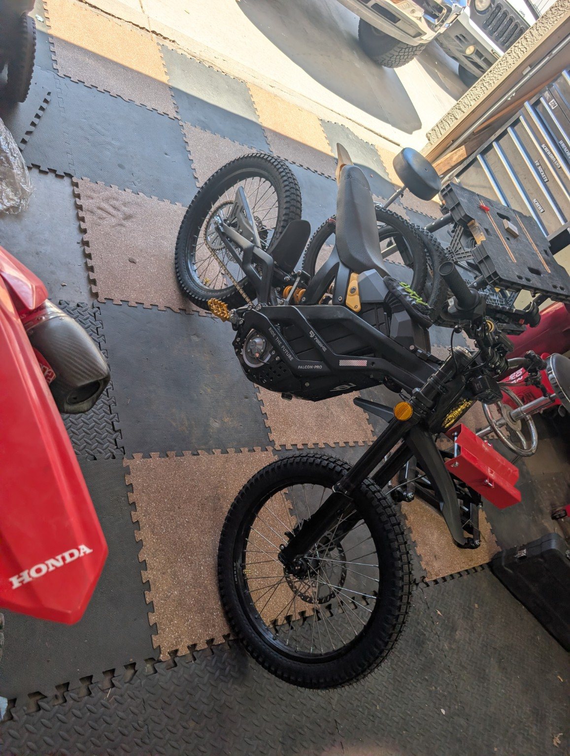 Black electric bike in the 224 Powersports shop
