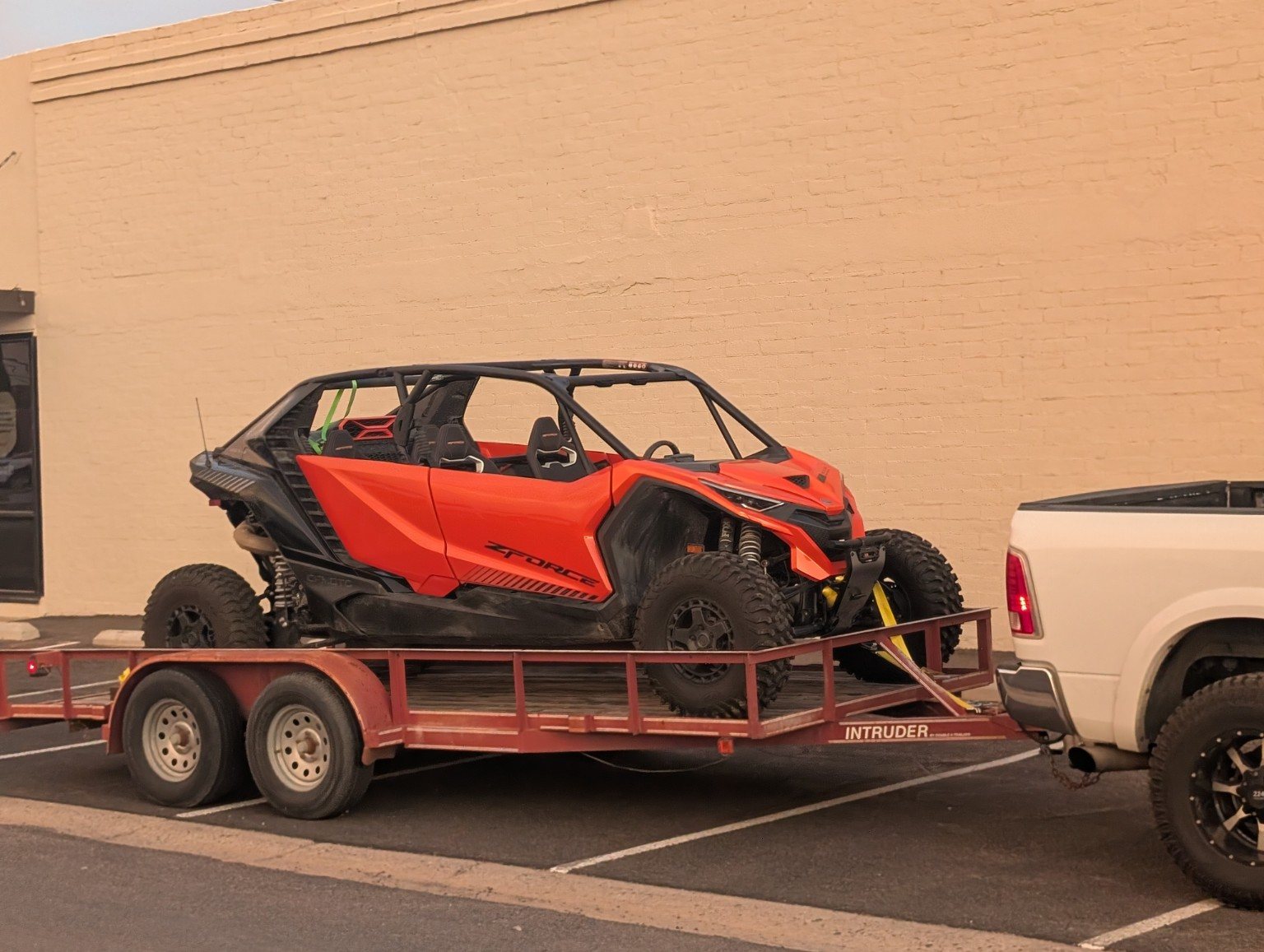 224 Powersports pickup and delivery setup with a UTV loaded on a trailer